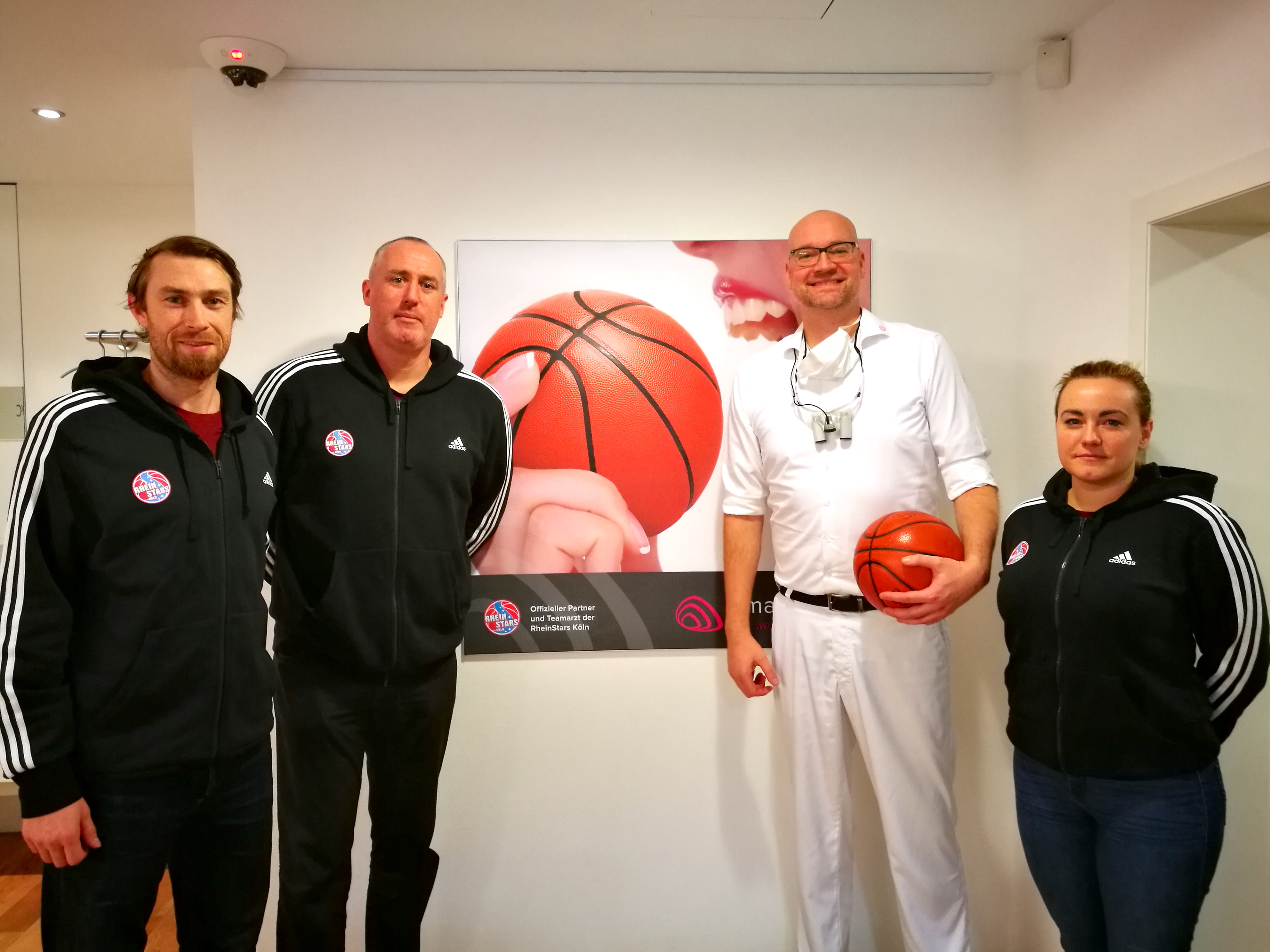 Trainer mit Arzt
